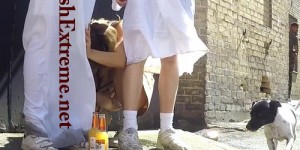 Public pissing at an outdoor carnival (Carnival_0019)